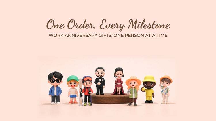 Row of custom 3D printed portrait figurines for a work anniversary program, each employee crafted from their own photo