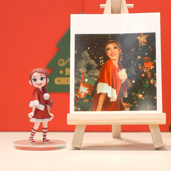 Christmas-themed figurine and painting on a stand against a red background with a Christmas tree.