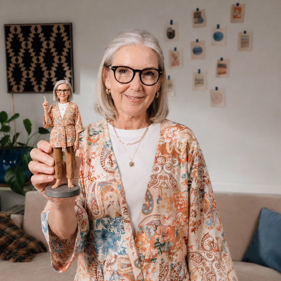 Woman holding a realistic custom statue of herself made from her photo