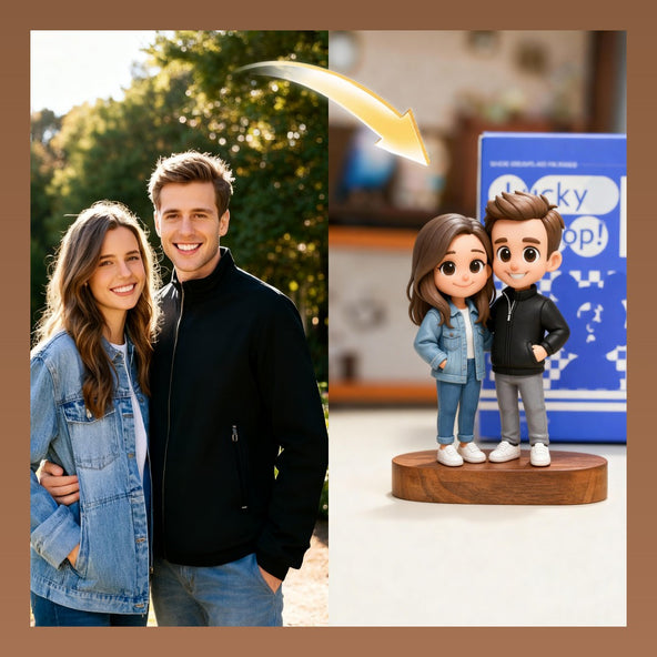 Real-life couple next to their custom bobblehead figurines in front of a TV.
