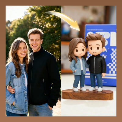 Real-life couple next to their 3D printed figurine on a wooden base.